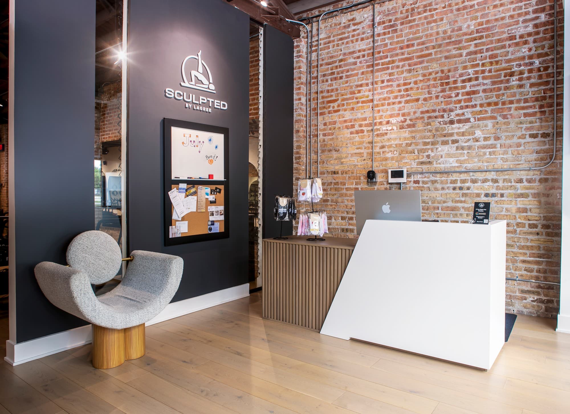 get in touch with us scuplted by lagree